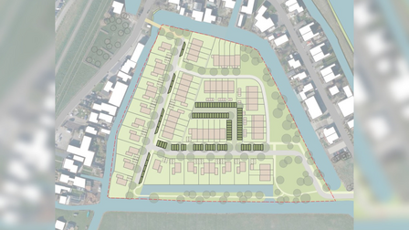 Ingetekende plattegrond van de woonwijk met woningen, groen en parkeerplaatsen
